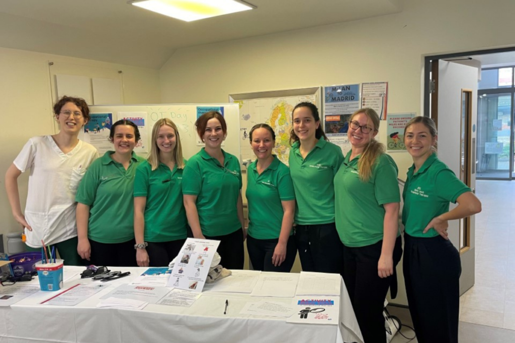 Our occupational therapy team at Frenchay stood next to one another behind their occupational therapy stand.