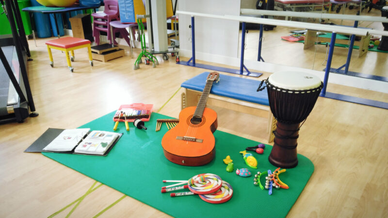 Musical instruments laid out on the floor.